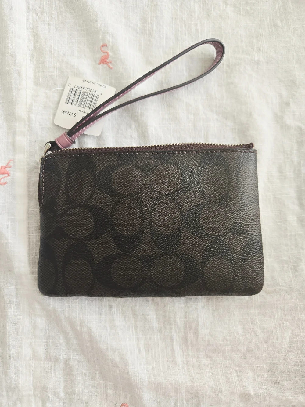 COACH Signature Wristlet Pouch in Brown and Dusty Pink